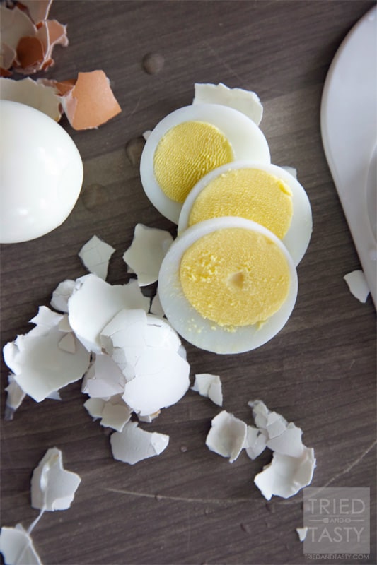 Oven Baked Hard Boiled Eggs // If you need to boil a large batch of eggs all at once or if you haven't been able to master the stove-top boiling method, then you MUST try these super simple oven baked eggs! | Tried and Tasty