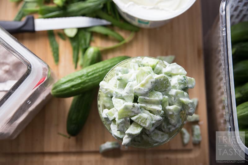 Quick & Easy Cucumber Salad // If you're looking for THE perfect side to your BBQ menu, look no further. This cucumber salad couldn't be easir OR tastier. You've got to try it to believe it. Your guests will be begging for seconds AND the recipe! | Tried and Tasty