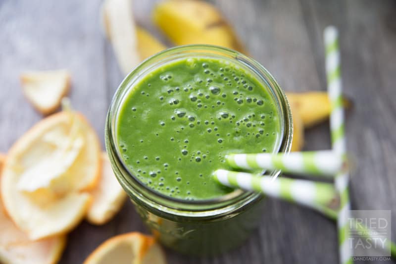 Banana Orange Green Smoothie // Doesn't get any easier than this delicious smoothie! All you need are a few key ingredients and you'll be on your way to a nutrition packed, no-sugar added, simple smoothie. Perfect to jump start your morning. Great for a mid-afternoon pick-me-up. Great for an afternoon snack the whole family will enjoy! | Tried and Tasty