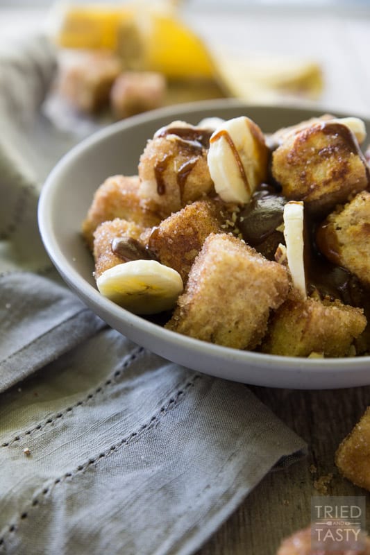 Pumpkin Spice Bananas Foster French Toast Bites // French toast is taken next level with these adorably delicious bites of heaven. You won't believe how wonderfully the flavors come together in this amazing fall inspired breakfast (that can be enjoyed all year long). The best bananas foster breakfast dessert around! | Tried and Tasty